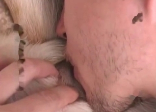 Guy is sucking his dog's dick
