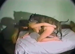 Busty girl is enjoying bestiality