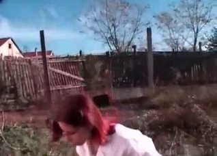 Redhead is playing with a dirty pet