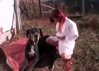 Redhead is playing with a dirty pet