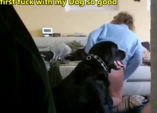 Black dog is going to thrust inside the hole