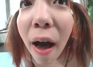 Awesome Asian bitch is blowing a dog