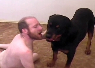 Black dog fucks a horny old man